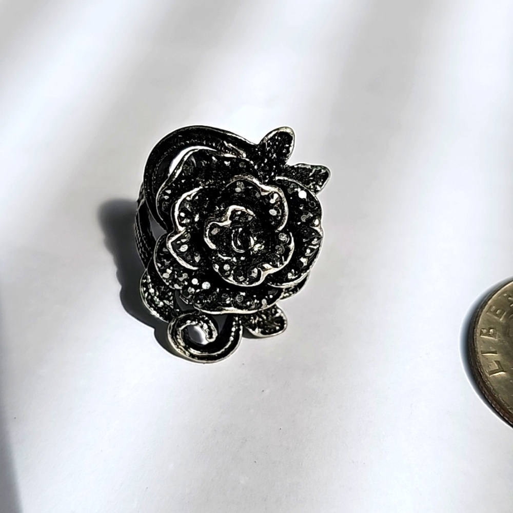 Silver tone and black crystal rose ring